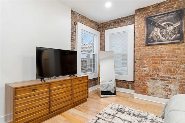 161 Morewood, Oakland, PA 15213 - living area with wood finished floors and brick wall