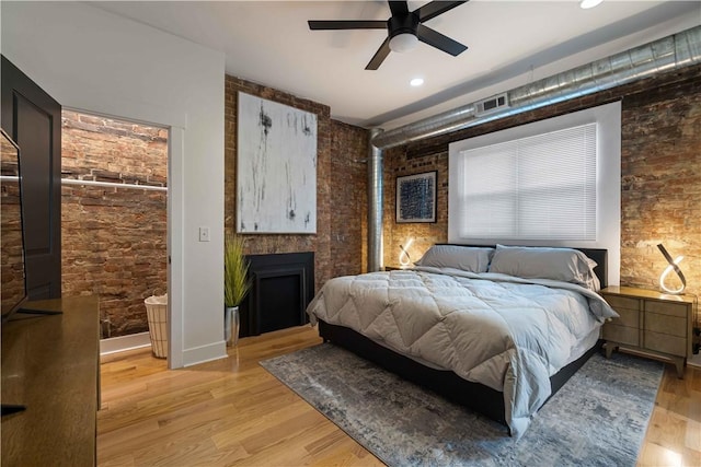 161 Morewood, Oakland, PA 15213 - bedroom featuring light wood-style flooring, a fireplace, recessed lighting, and ceiling fan
