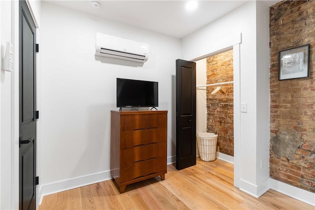 161 Morewood, Oakland, PA 15213 - bedroom with an AC wall unit and light wood finished floors