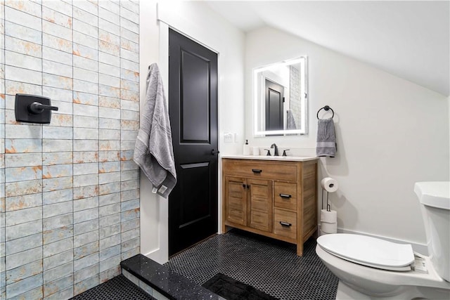 161 Morewood, Oakland, PA 15213 - bathroom featuring vanity, tile patterned flooring, lofted ceiling, and tiled shower