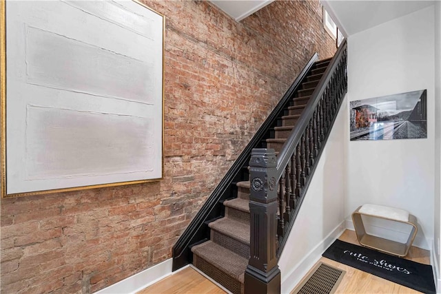 161 Morewood, Oakland, PA 15213 - staircase featuring wood finished floors and brick wall