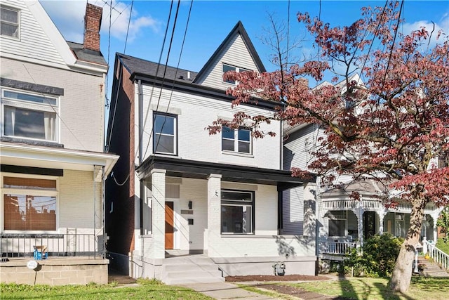 161 Morewood, Oakland, PA 15213 - view of front of property featuring a porch and brick siding