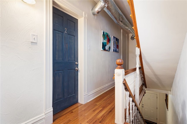 625 S Aiken Ave, Shadyside, PA 15232 - hallway with an upstairs landing and light wood-style floors