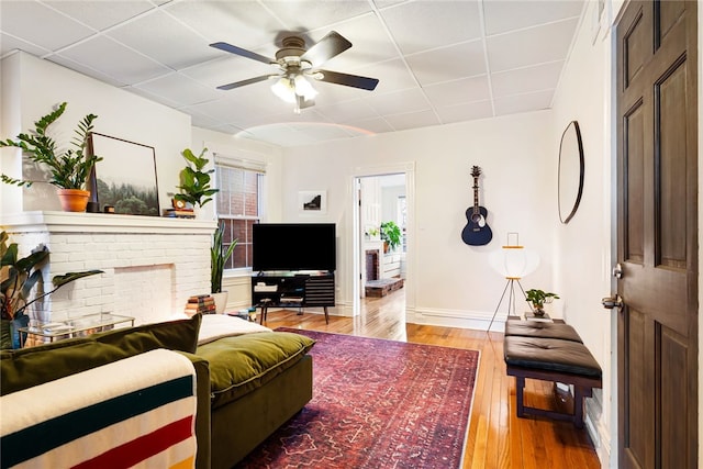 625 S Aiken Ave, Shadyside, PA 15232 - living area with a drop ceiling, wood-type flooring, and ceiling fan