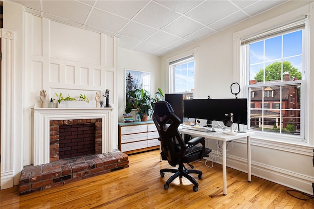625 S Aiken Ave, Shadyside, PA 15232 - office area with a paneled ceiling, wood finished floors, and a fireplace
