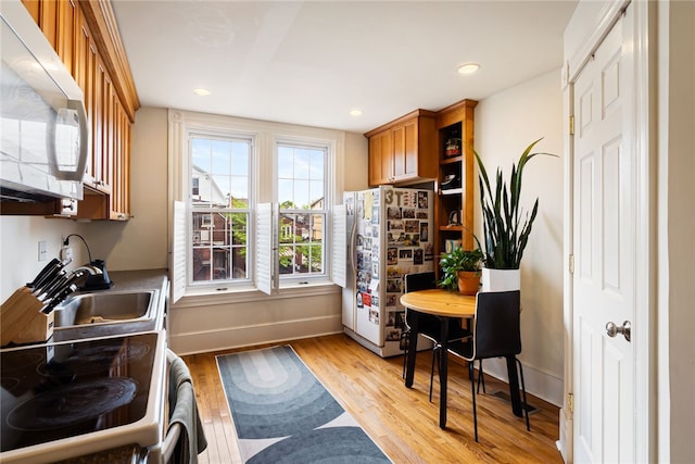 625 S Aiken Ave, Shadyside, PA 15232 - kitchen featuring white appliances, brown cabinets, light wood-style floors, recessed lighting, and open shelves