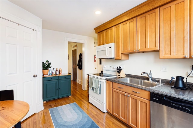625 S Aiken Ave, Shadyside, PA 15232 - kitchen with white appliances, light wood-style floors, dark countertops, and recessed lighting