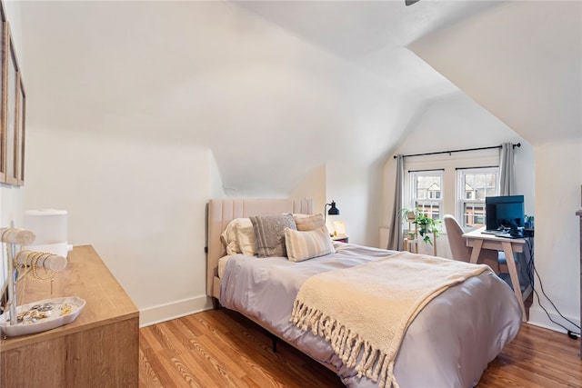 625 S Aiken Ave, Shadyside, PA 15232 - bedroom featuring lofted ceiling, wood finished floors, and a desk