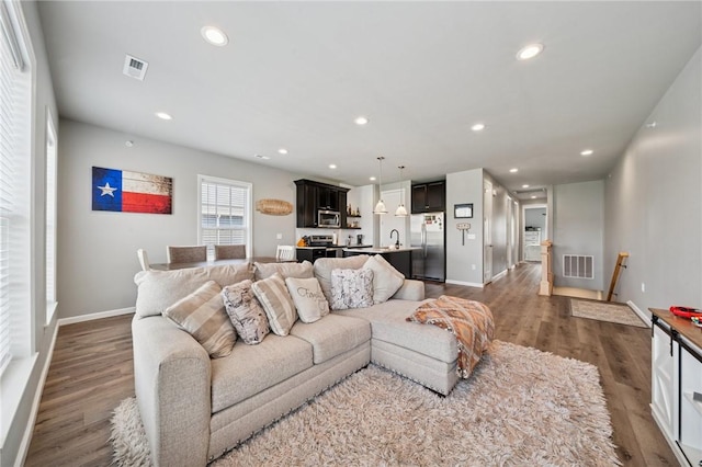 1431 Hastings Cres, South Fayette, PA 15017 - living area with dark wood-type flooring and recessed lighting