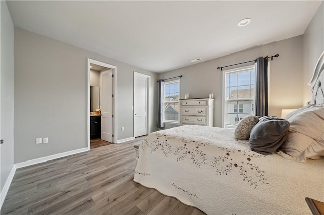 1431 Hastings Cres, South Fayette, PA 15017 - bedroom featuring wood finished floors, ensuite bathroom, and recessed lighting