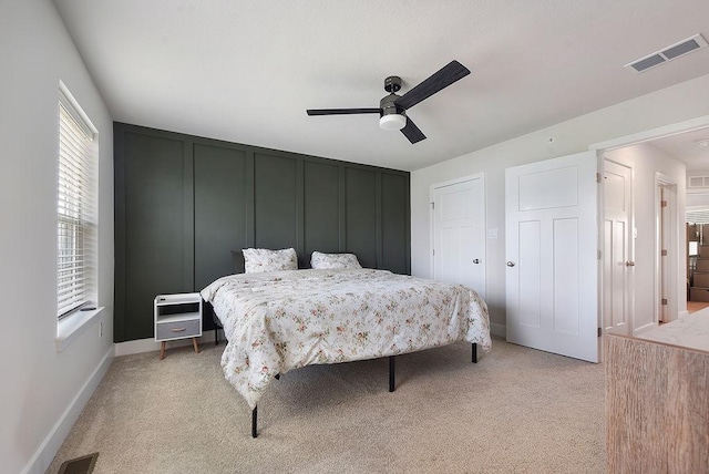 1408 Commons Ln, South Fayette, PA 15017 - bedroom featuring light carpet, ceiling fan, and a decorative wall
