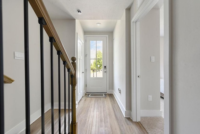 1408 Commons Ln, South Fayette, PA 15017 - entryway with light wood finished floors and stairway