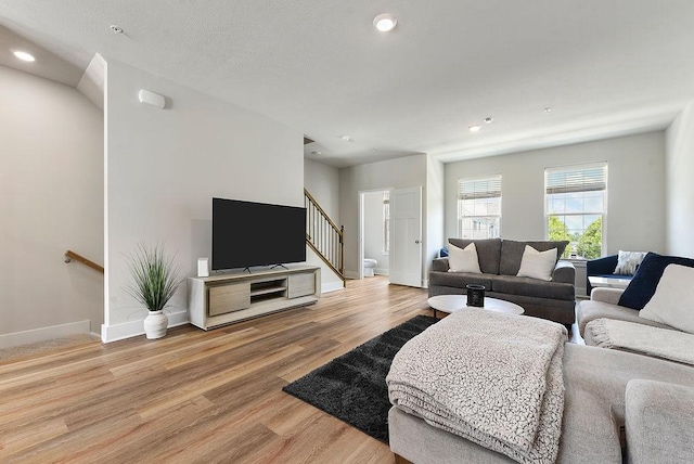 1408 Commons Ln, South Fayette, PA 15017 - living room featuring light wood-type flooring, stairway, and recessed lighting