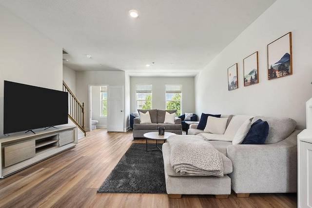 1408 Commons Ln, South Fayette, PA 15017 - living room featuring wood finished floors, stairs, and recessed lighting