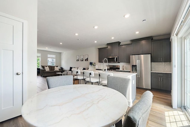 1408 Commons Ln, South Fayette, PA 15017 - dining room featuring light wood-style flooring and recessed lighting
