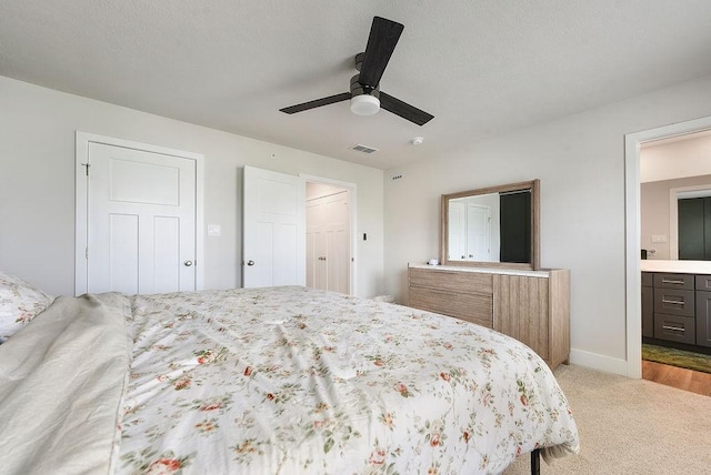 1408 Commons Ln, South Fayette, PA 15017 - carpeted bedroom with ensuite bathroom and ceiling fan
