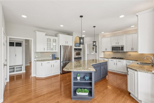 203 Cashmere Ct, Cranberry Twp, PA 16066 - kitchen featuring stainless steel appliances, white cabinets, tasteful backsplash, and recessed lighting