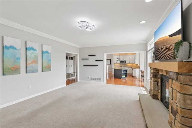 203 Cashmere Ct, Cranberry Twp, PA 16066 - living room with light carpet, a fireplace, crown molding, and recessed lighting