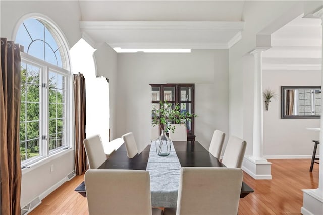 203 Cashmere Ct, Cranberry Twp, PA 16066 - dining room featuring ornate columns, crown molding, and light wood-style floors