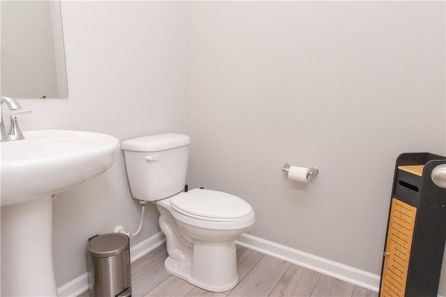 132 Hidden Acres Dr, Forward Twp, PA 16033 - bathroom with toilet and wood finished floors