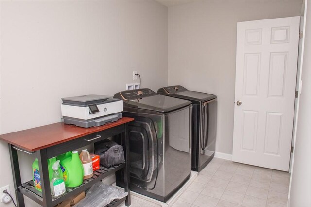 132 Hidden Acres Dr, Forward Twp, PA 16033 - washroom featuring washer and dryer and light tile patterned flooring