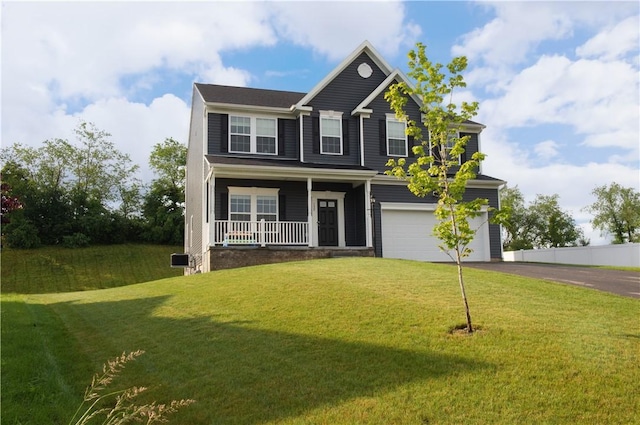 132 Hidden Acres Dr, Forward Twp, PA 16033 - view of front of house featuring driveway, covered porch, a garage, and a front yard