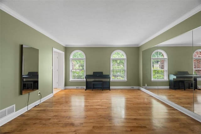 116 Bunker Hill Dr, Peters Twp, PA 15317 - unfurnished living room featuring wood finished floors and crown molding