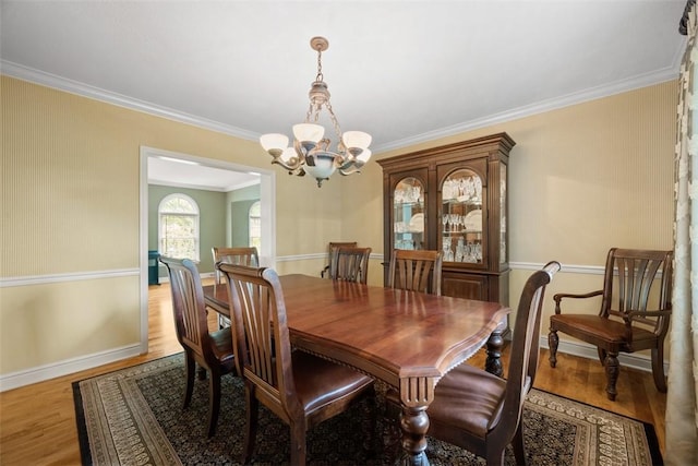 116 Bunker Hill Dr, Peters Twp, PA 15317 - dining room featuring a chandelier, crown molding, and wood finished floors