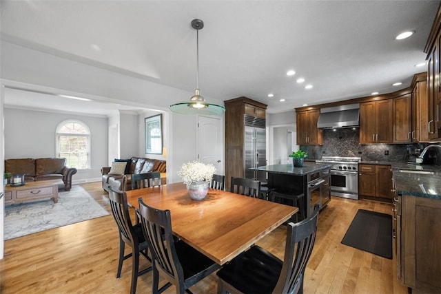 116 Bunker Hill Dr, Peters Twp, PA 15317 - dining room featuring light wood-type flooring and recessed lighting