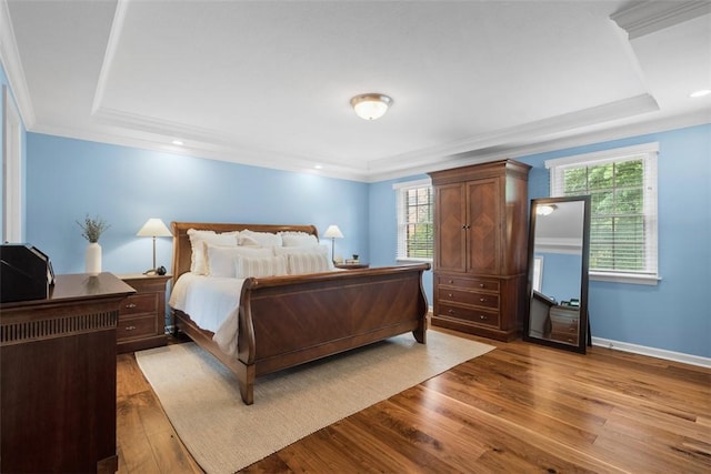 116 Bunker Hill Dr, Peters Twp, PA 15317 - bedroom featuring a raised ceiling, light wood-style floors, multiple windows, crown molding, and recessed lighting