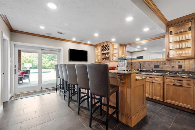 116 Bunker Hill Dr, Peters Twp, PA 15317 - bar area with ornamental molding, decorative backsplash, recessed lighting, and dark tile patterned floors