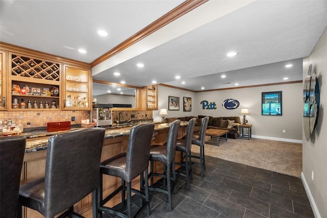 116 Bunker Hill Dr, Peters Twp, PA 15317 - indoor wet bar featuring crown molding, dark carpet, tasteful backsplash, and recessed lighting