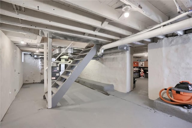 1707 Cosmos St, Lincoln Place, PA 15207 - unfinished below grade area featuring stairway and heating unit