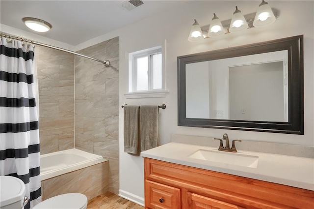 1707 Cosmos St, Lincoln Place, PA 15207 - bathroom featuring shower / tub combo, vanity, and wood finished floors