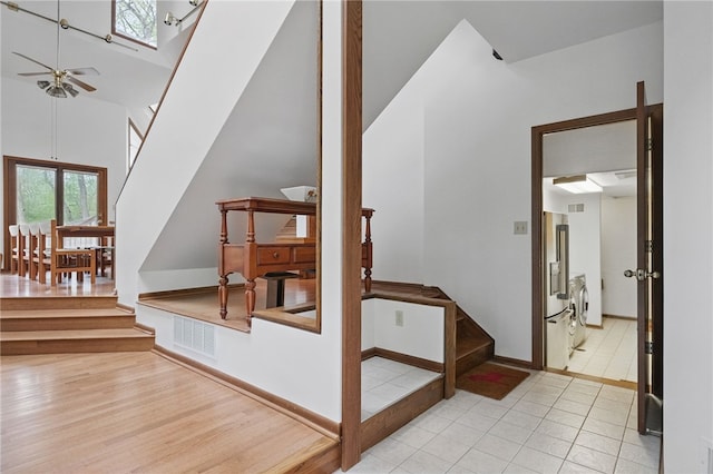 1 Quail Hill Rd, Fox Chapel, PA 15238 - stairway featuring ceiling fan, high vaulted ceiling, and wood finished floors