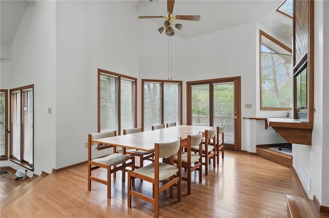 1 Quail Hill Rd, Fox Chapel, PA 15238 - dining room with high vaulted ceiling, light wood finished floors, and ceiling fan