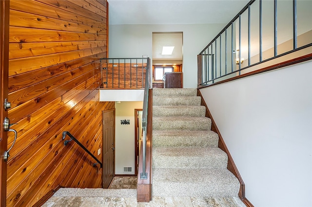 317 Bridlewood Dr, Hempfield Twp Wml, PA 15601 - stairway with wooden walls and baseboards