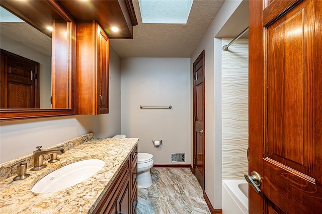 317 Bridlewood Dr, Hempfield Twp Wml, PA 15601 - bathroom with vanity, a textured ceiling, and shower / tub combination