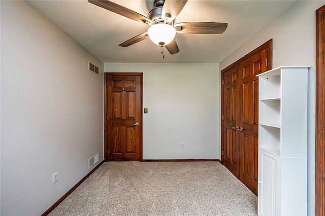 317 Bridlewood Dr, Hempfield Twp Wml, PA 15601 - unfurnished bedroom featuring carpet flooring and ceiling fan