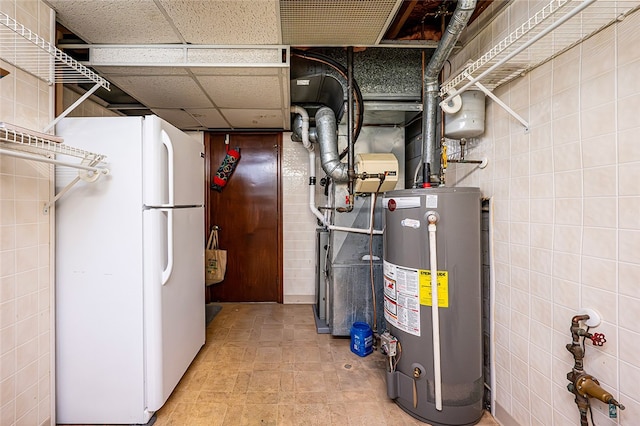317 Bridlewood Dr, Hempfield Twp Wml, PA 15601 - utility room featuring water heater