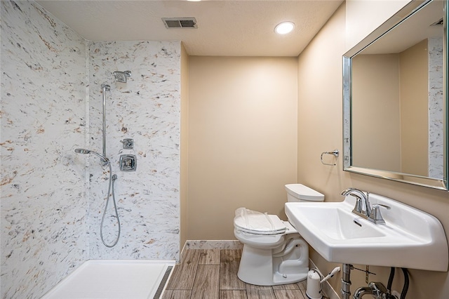 317 Bridlewood Dr, Hempfield Twp Wml, PA 15601 - bathroom with a stall shower, wood tiled floors, and recessed lighting