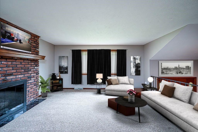 317 Bridlewood Dr, Hempfield Twp Wml, PA 15601 - living room featuring carpet floors, a brick fireplace, and a textured ceiling