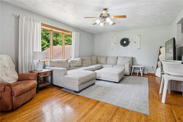1343 Venetia Rd, Nottingham, PA 15330 - living area with ceiling fan and light wood-style flooring