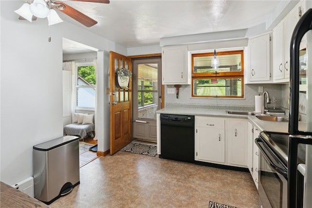 1343 Venetia Rd, Nottingham, PA 15330 - kitchen featuring black dishwasher, stainless steel range with electric cooktop, tasteful backsplash, white cabinets, and light countertops