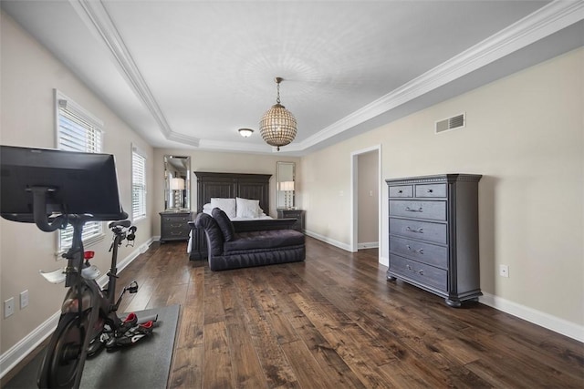 306 Hedgerow Dr, Peters Twp, PA 15367 - bedroom featuring dark wood-style flooring, a tray ceiling, and crown molding