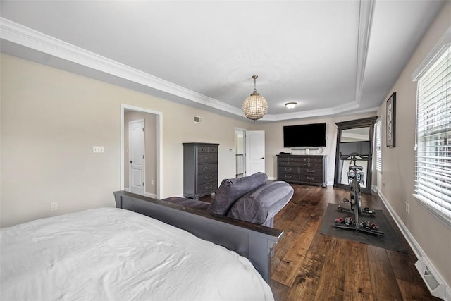 306 Hedgerow Dr, Peters Twp, PA 15367 - bedroom featuring wood finished floors, a tray ceiling, and crown molding