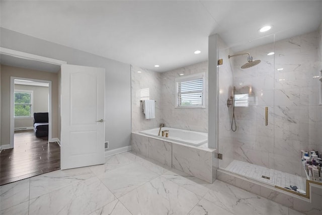 306 Hedgerow Dr, Peters Twp, PA 15367 - full bath featuring healthy amount of natural light, a garden tub, a marble finish shower, marble finish flooring, and recessed lighting