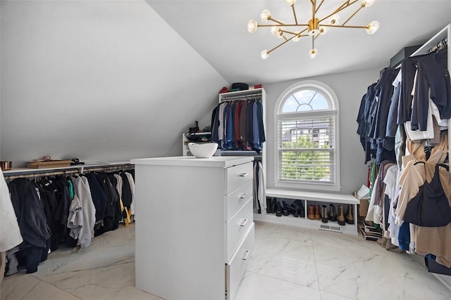 306 Hedgerow Dr, Peters Twp, PA 15367 - spacious closet with a chandelier, marble finish floors, and lofted ceiling