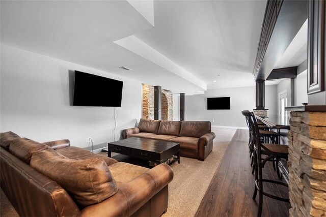 306 Hedgerow Dr, Peters Twp, PA 15367 - living area with dark wood-style flooring and decorative columns