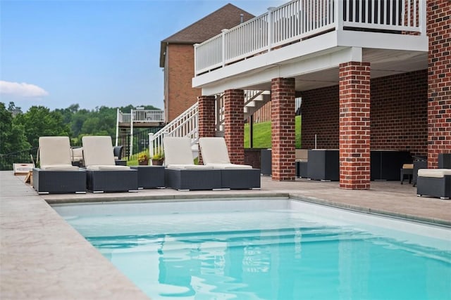 306 Hedgerow Dr, Peters Twp, PA 15367 - outdoor pool with outdoor lounge area, stairway, and a patio
